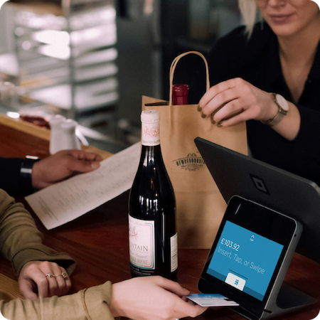 Retailer customer interaction in wine shop